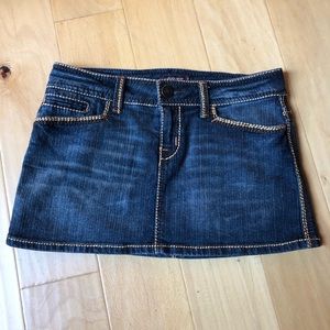 Brown threaded denim mini skirt.
